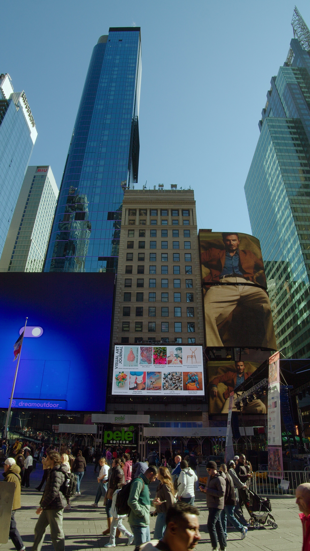 Visual Art Journal billboard in Times Square, New York, daytime