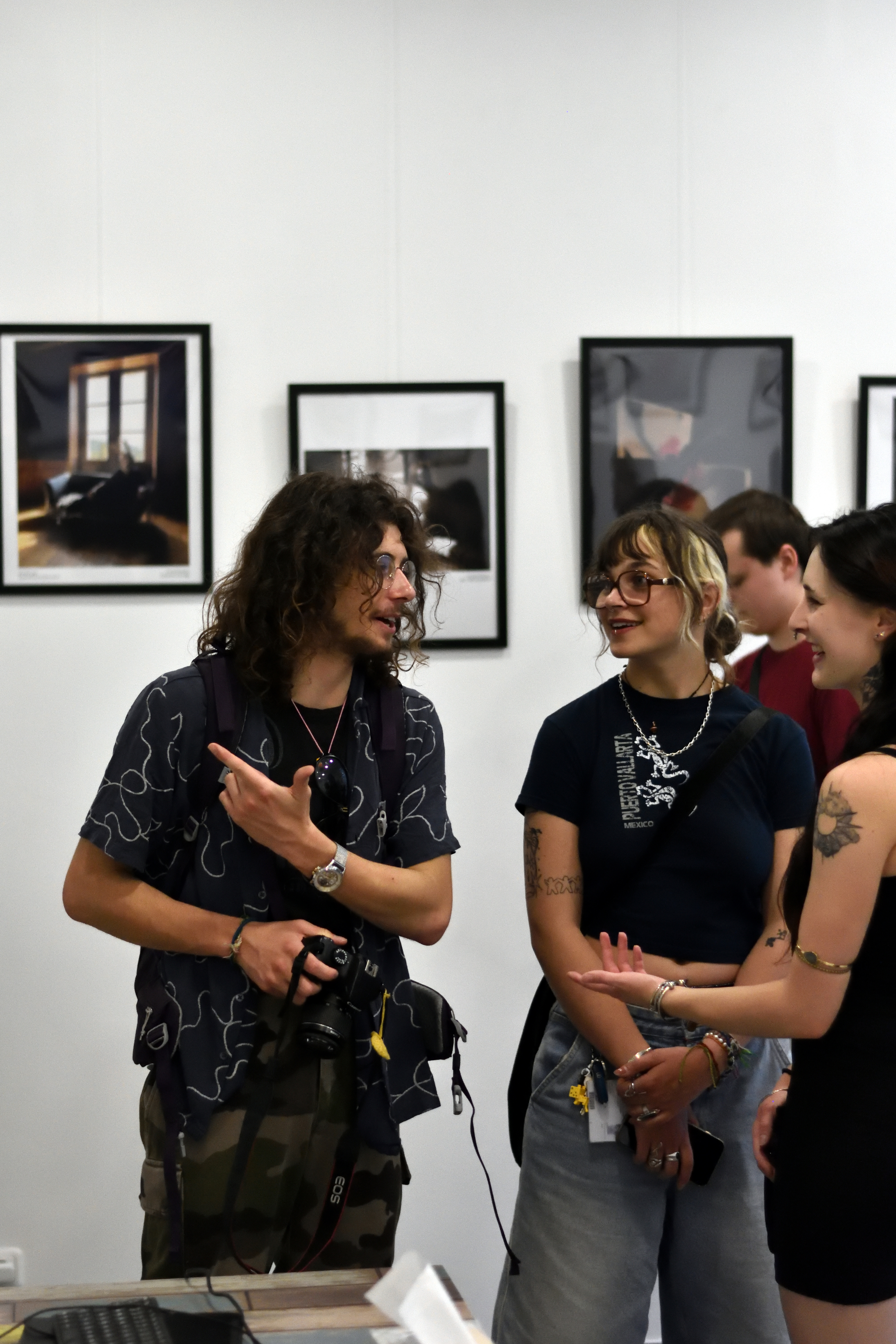 Visitor viewing artwork at The Names Gallery in Vienna